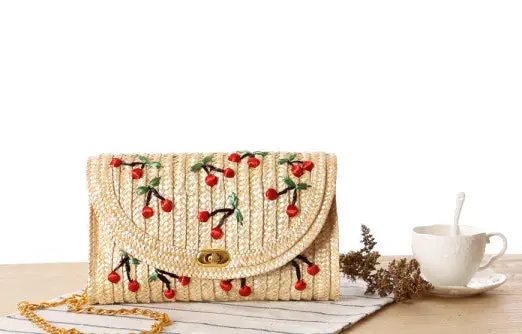 Cherry-Themed Straw Crossbody Bag with Metallic Chain Strap